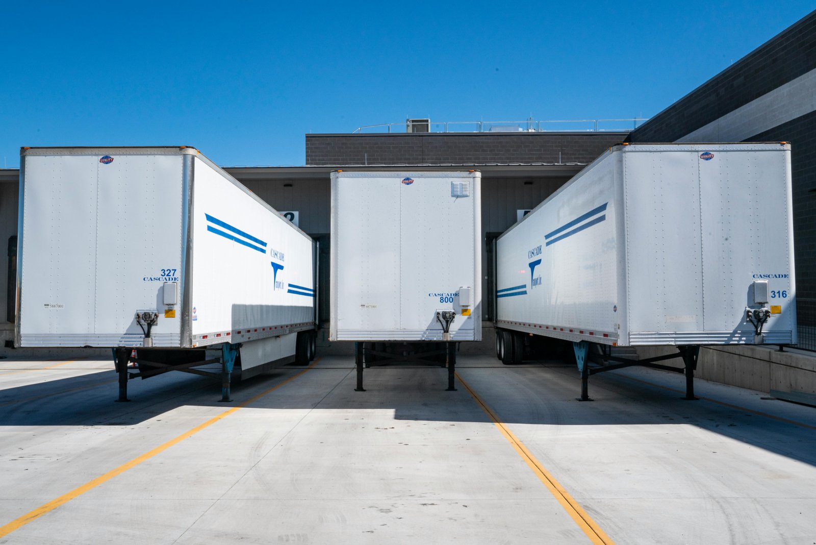 Stock photo showing a logistics scene with trucks and transportation activities